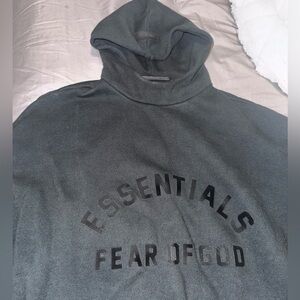 Fear of God Essentials Hoodie in Jet Black 2023